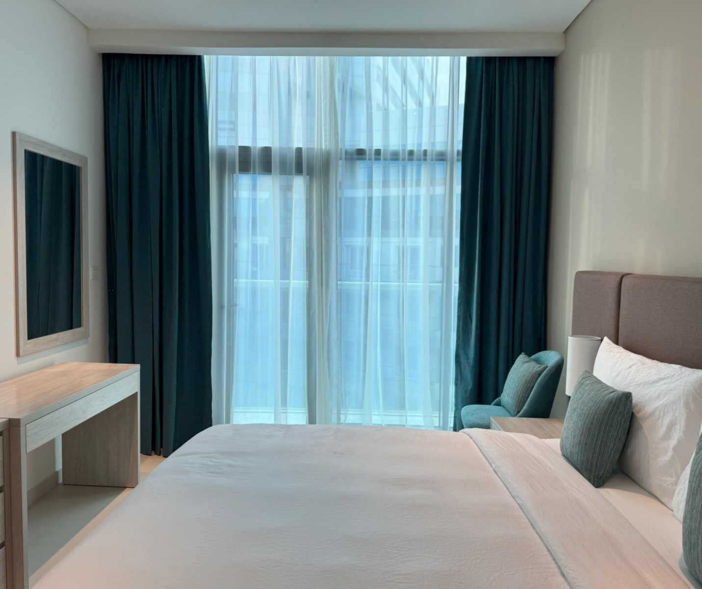 Teal blackout curtains with sheer in a Dubai kids bedroom — child-safe install by BCD